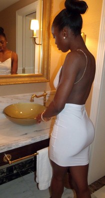 Bald ebony slut in the
